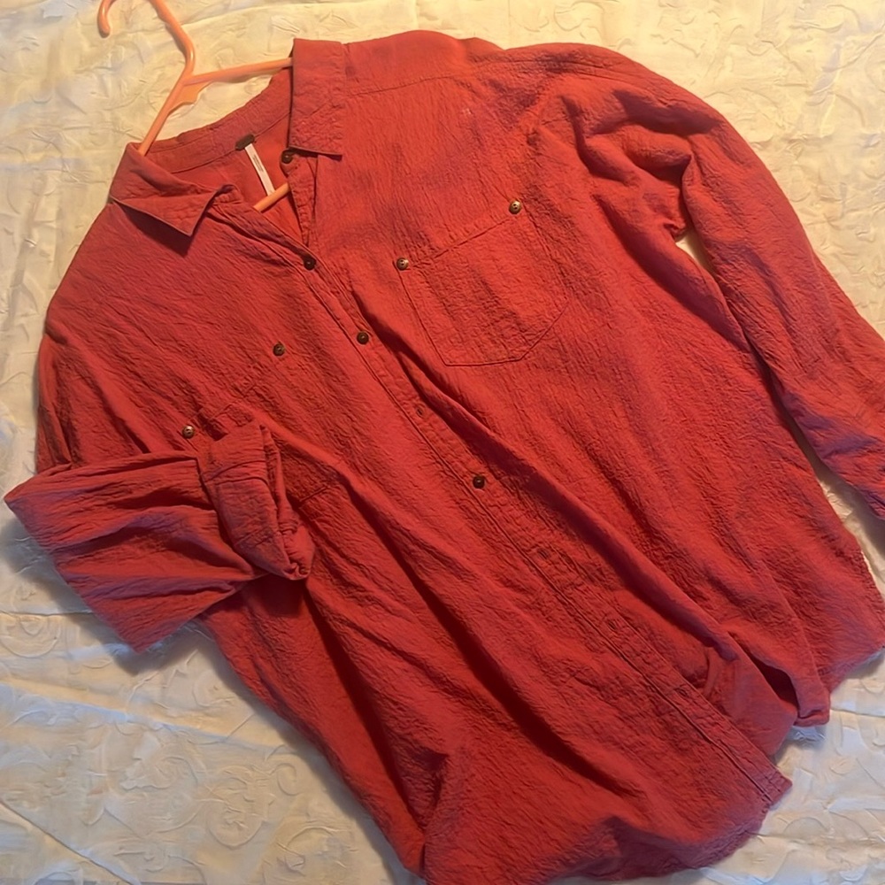 Free people, blouse, very blousy more like a tunic.